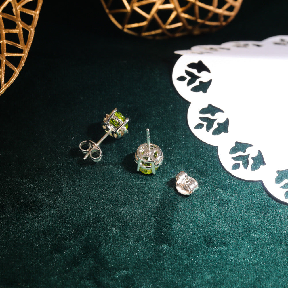 Boucles d'oreilles en argent 925 et péridot incrusté, design italien raffiné. 
